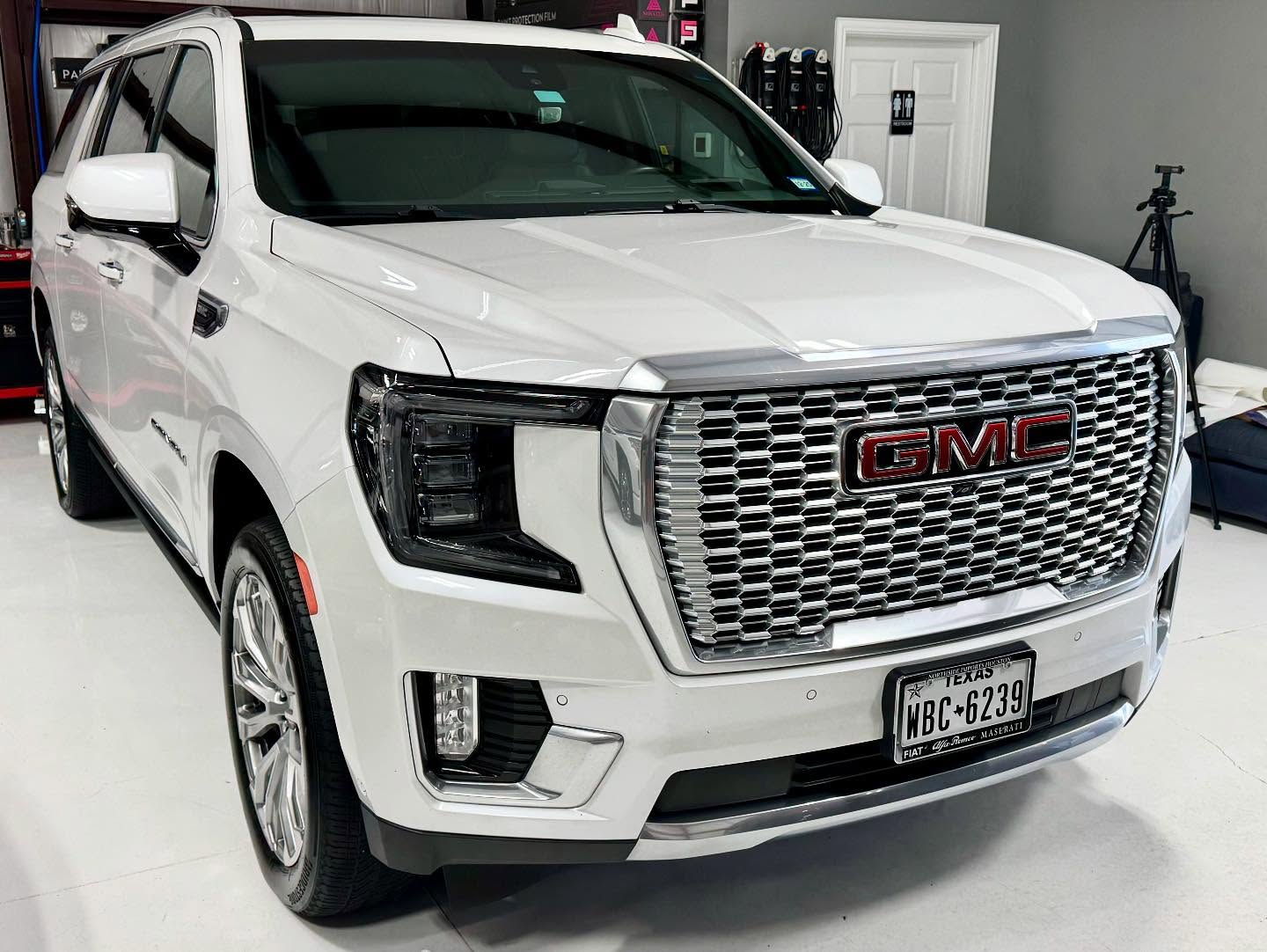 White GMC Yukon XL Denali after a Diamond full maintenance package detail