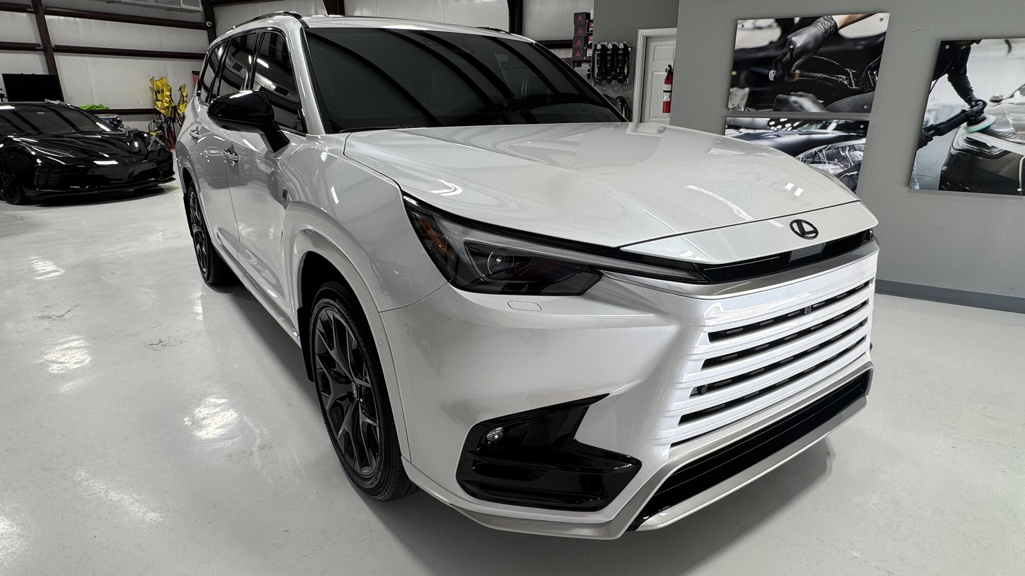 White Lexus TX with window tint