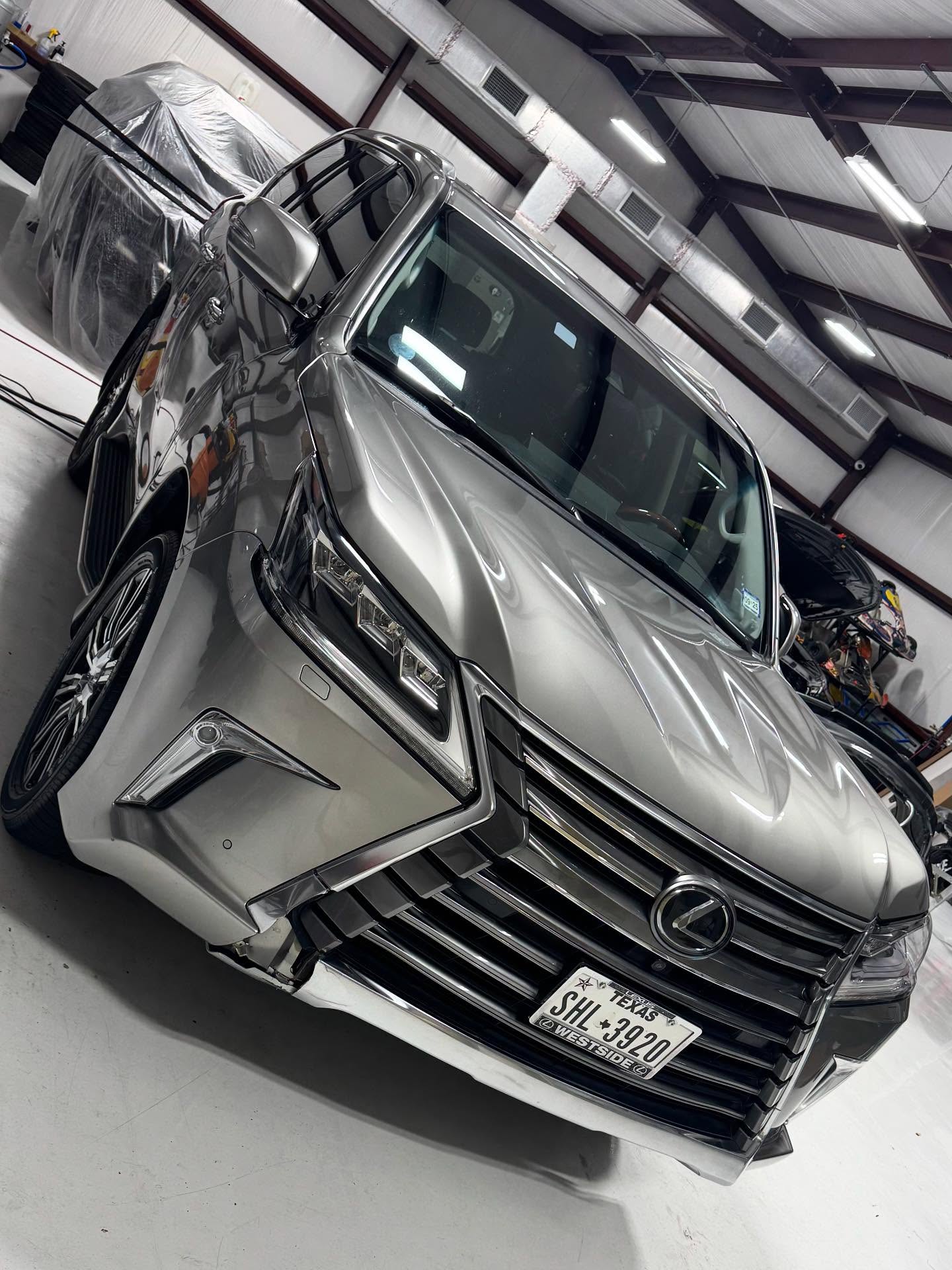 Silver Lexus LX 570 with a glossy finish after a full maintenance exterior detail